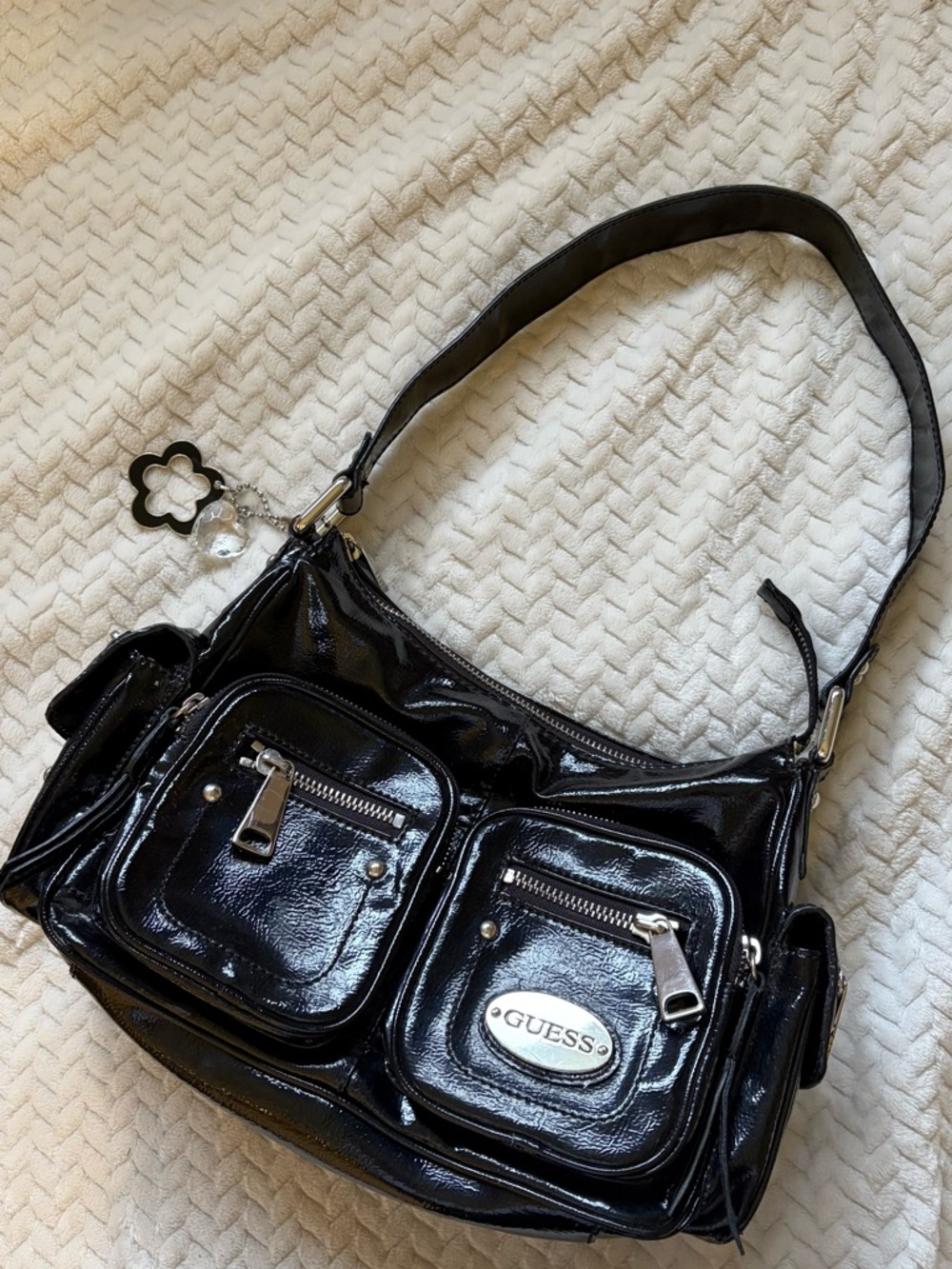 GUESS Black Patent Shoulder Bag with Dual Front Pockets and Charm
